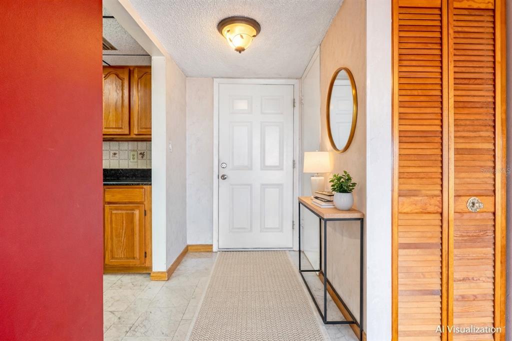 This AI-generated image shows an entryway with a white door, console table, and louvered closet — 100 SILVER BEACH AVENUE UNIT 816, DAYTONA BEACH, FL