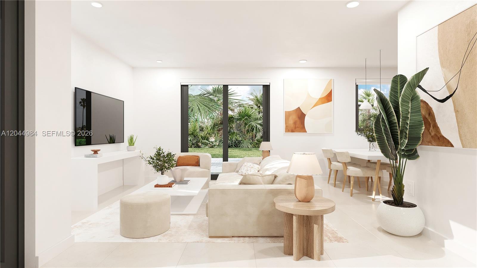 A modern kitchen features light wood cabinets, stainless steel appliances, and white marble-patterned flooring — 13331 SW 265th Terr, Homestead FL 33032, HOMESTEAD, FL