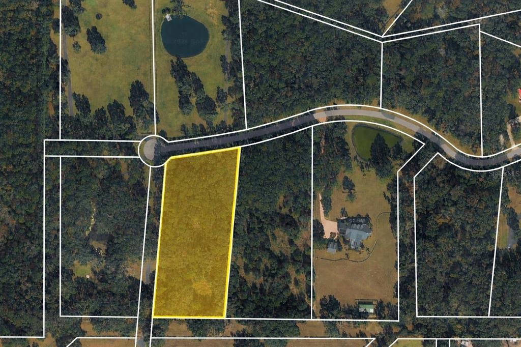 An aerial map view shows a highlighted rectangular plot of land bordering a curved road — 11 SW 144TH COURT, OCALA, FL