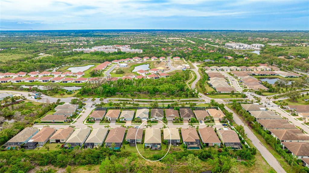 An aerial view shows a suburban neighborhood with a circled single-family home — 5416 HOPE SOUND CIRCLE, SARASOTA, FL