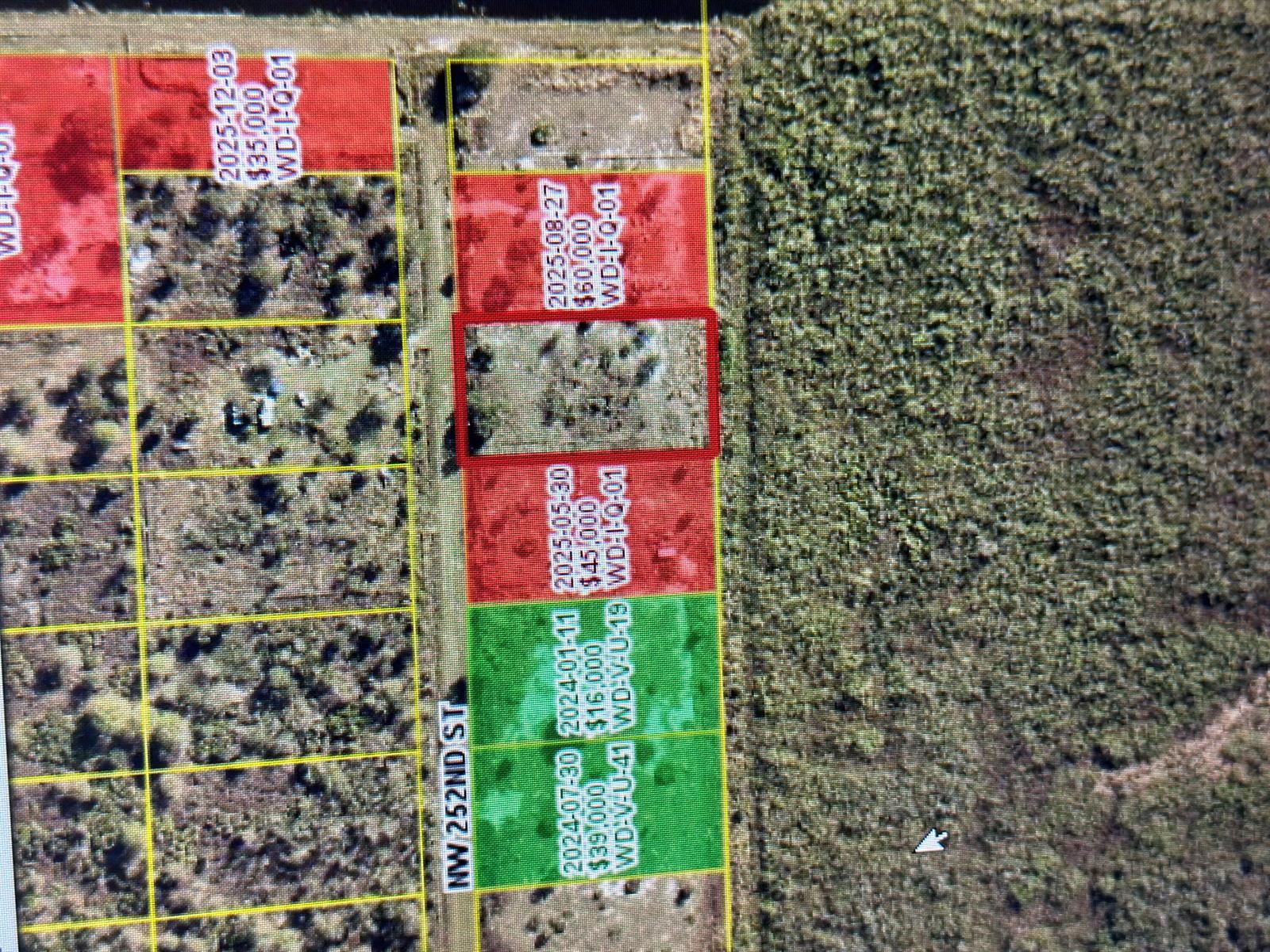 This is a satellite map showing several rectangular land parcels with price and ID labels — 15322 NW 252nd Street, Okeechobee FL 34972, OKEECHOBEE, FL