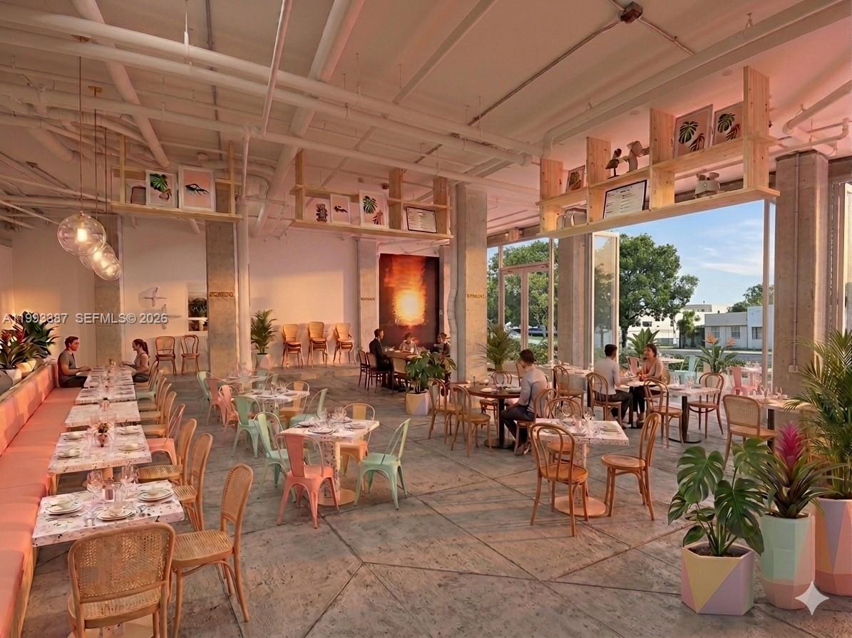 This rendering shows an open-concept restaurant interior with industrial ceilings, concrete floors, and pastel-colored furniture — 1215 West Ave # 1, Miami Beach FL 33139, MIAMI BEACH, FL