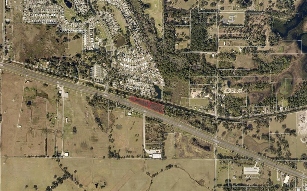 An aerial map view shows a highlighted rectangular parcel of land along a highway — 605-625 STATE ROAD 44, LEESBURG, FL