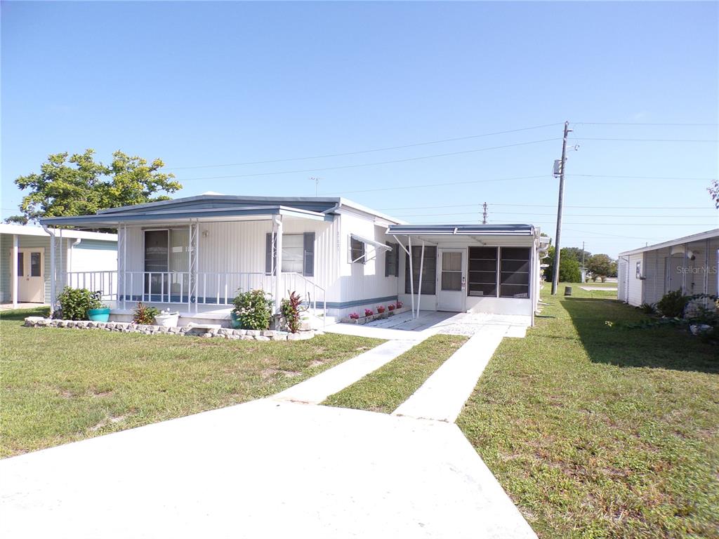 37021 SANDRA AVENUE, ZEPHYRHILLS, FL — photo 2 of 30