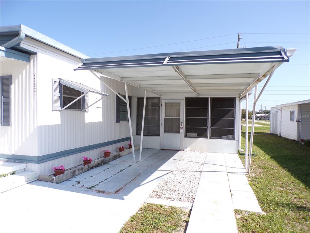 37021 SANDRA AVENUE, ZEPHYRHILLS, FL — photo 3 of 30