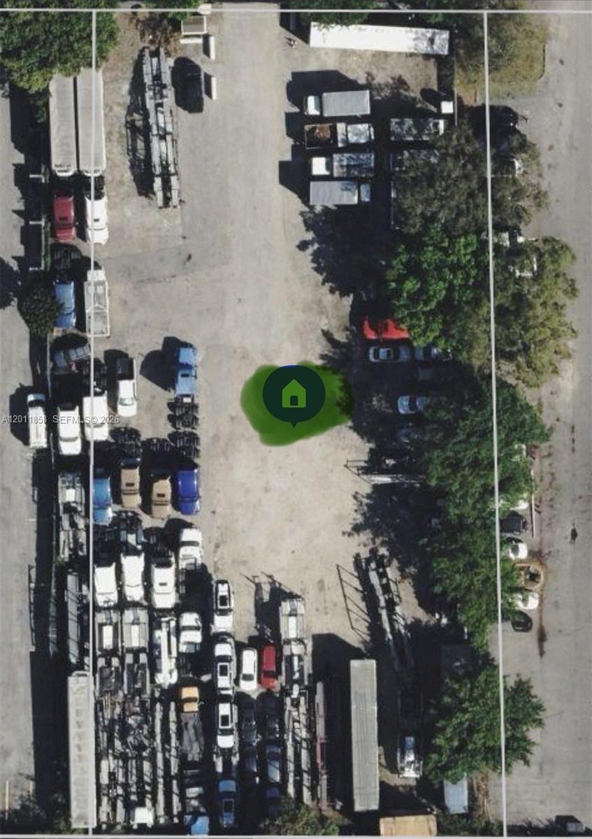 This is an aerial view of a commercial lot filled with parked trucks and trailers — 8322 NW 64, Miami FL 33166, MIAMI, FL
