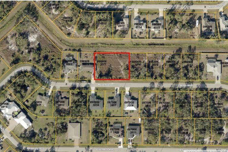This is an aerial map showing a vacant residential lot outlined in red — MAYO AVENUE, NORTH PORT, FL