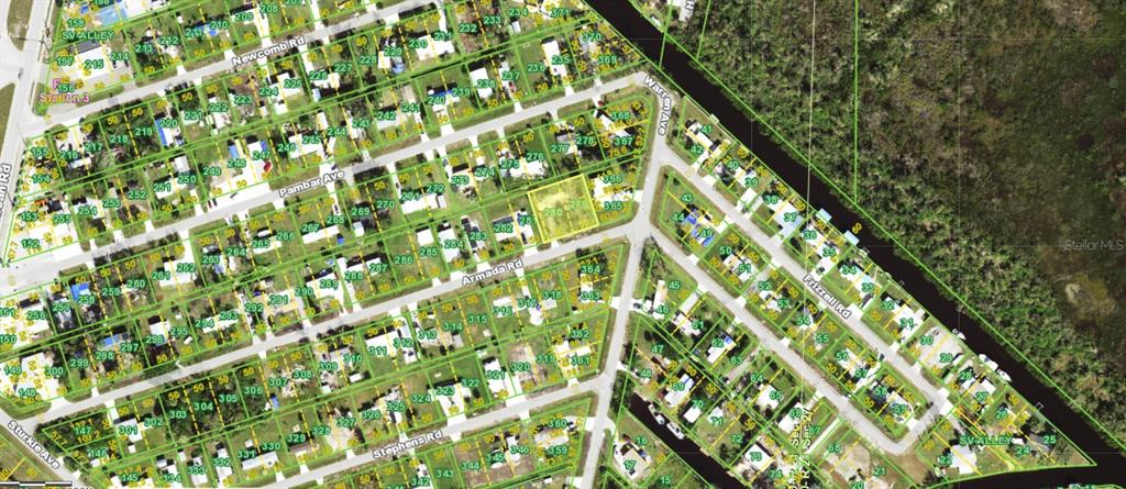 This is an aerial map showing a residential neighborhood with numbered property lots — 14484 ARMADA ROAD, PORT CHARLOTTE, FL