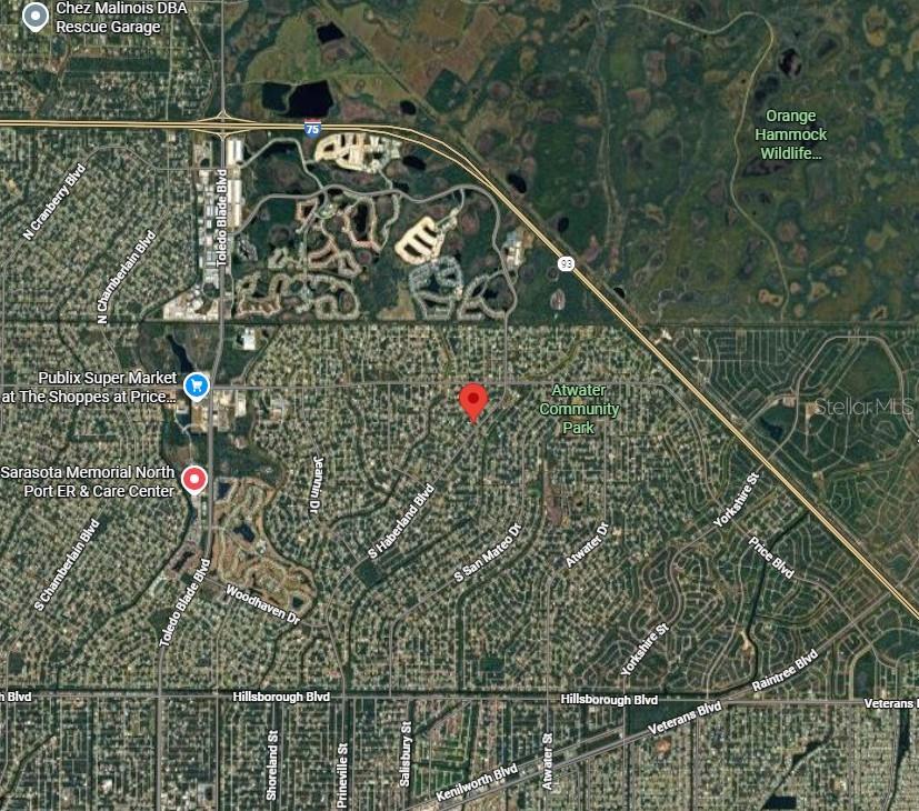 This is a satellite map showing a residential neighborhood with a red location marker — Lot 12 KAABE AVENUE, NORTH PORT, FL