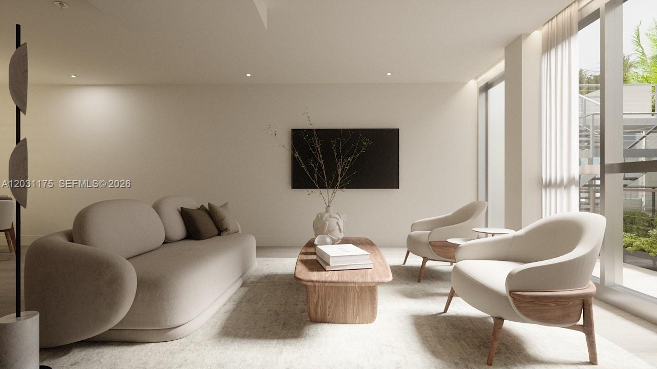 This rendering shows a modern living room with neutral furniture, a wooden coffee table, and windows — 260 Collins Ave # 302, Miami Beach FL 33139, MIAMI BEACH, FL