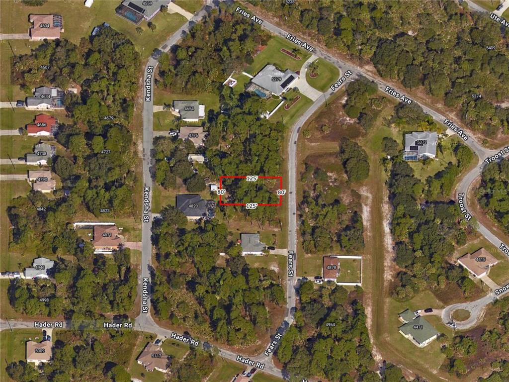This is an aerial map showing a rectangular property lot outlined in red — FEARS STREET, NORTH PORT, FL