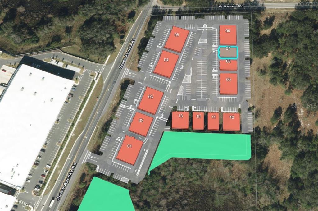This is an aerial map showing a commercial property layout with numbered buildings and parking lots — 2625 OCOEE APOPKA ROAD UNIT 7, APOPKA, FL