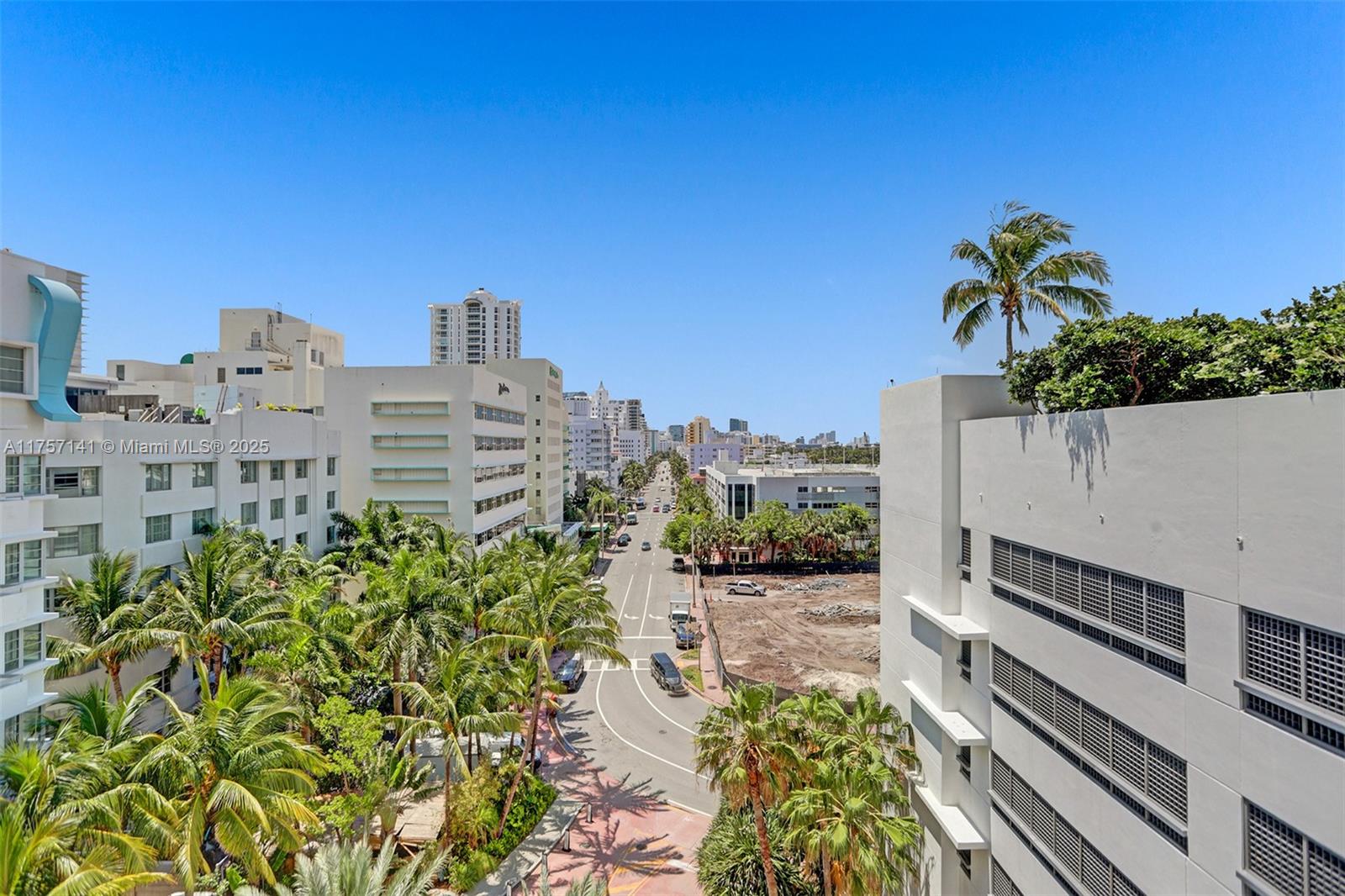 An elevated view shows a city street lined with palm trees and mid-rise buildings — 4401 Collins Ave, Miami Beach FL 33140, MIAMI BEACH, FL