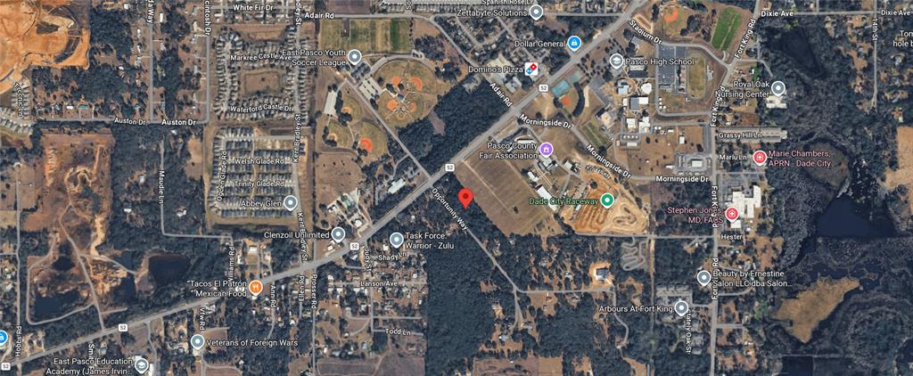 This is an aerial map view of a property located near a fairground and raceway — 36520-36522-36526 COUNTY ROAD 52, DADE CITY, FL