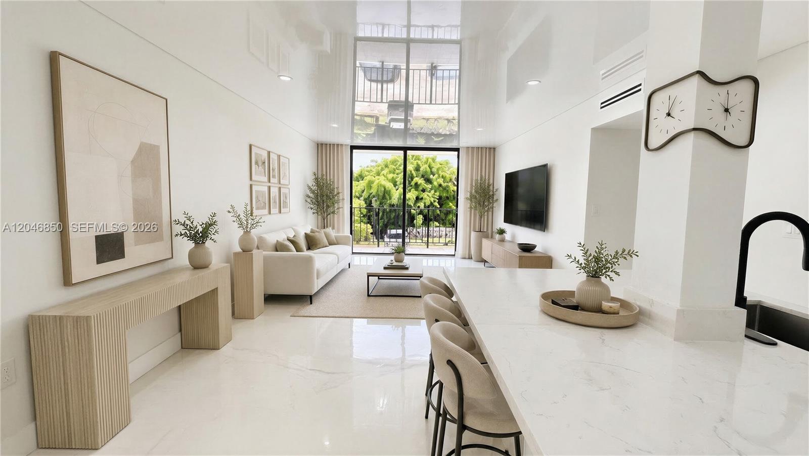 A modern living room and kitchen area features white marble floors, high ceilings, and a balcony — 9682 Fontainebleau Blvd # 203, Miami FL 33172, MIAMI, FL