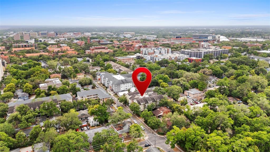 An aerial view shows a multi-story apartment complex marked with a red location pin — 1500 NW 4TH AVENUE UNIT 208, GAINESVILLE, FL