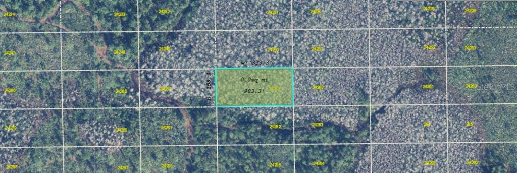 An aerial map view shows a rectangular plot of land highlighted in light blue — DILL ROAD, ORLANDO, FL