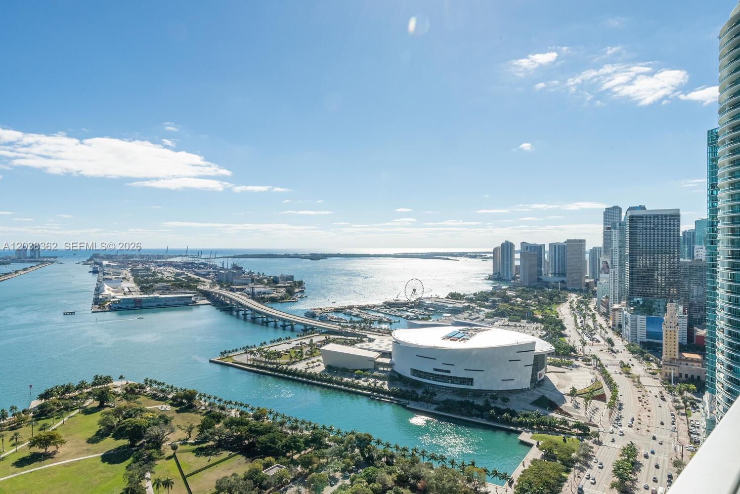 An elevated view of the Miami waterfront, featuring the Kaseya Center and a bridge — 1100 Biscayne Blvd # 4103, Miami FL 33132, MIAMI, FL