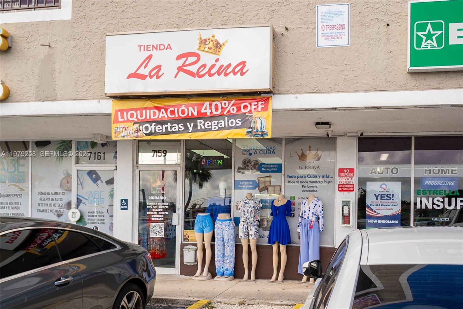 The exterior of a retail storefront features a sign for Tienda La Reina — 7159 sw 8 st, Miami FL 33144, MIAMI, FL