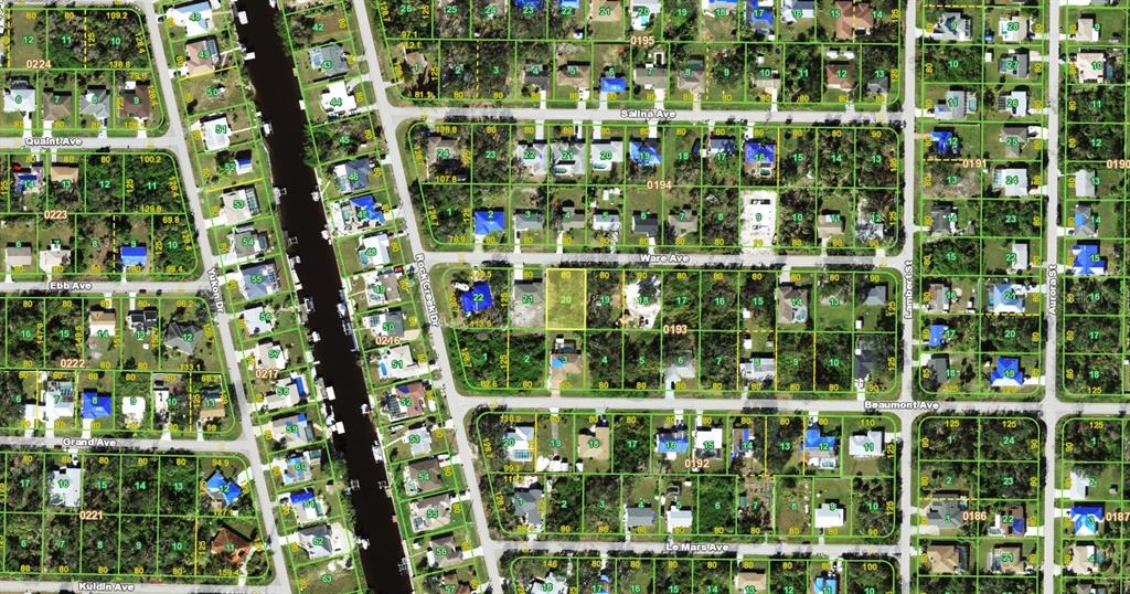 This is an aerial map showing residential lots and streets in a suburban neighborhood — 1165 WARE AVENUE, PORT CHARLOTTE, FL