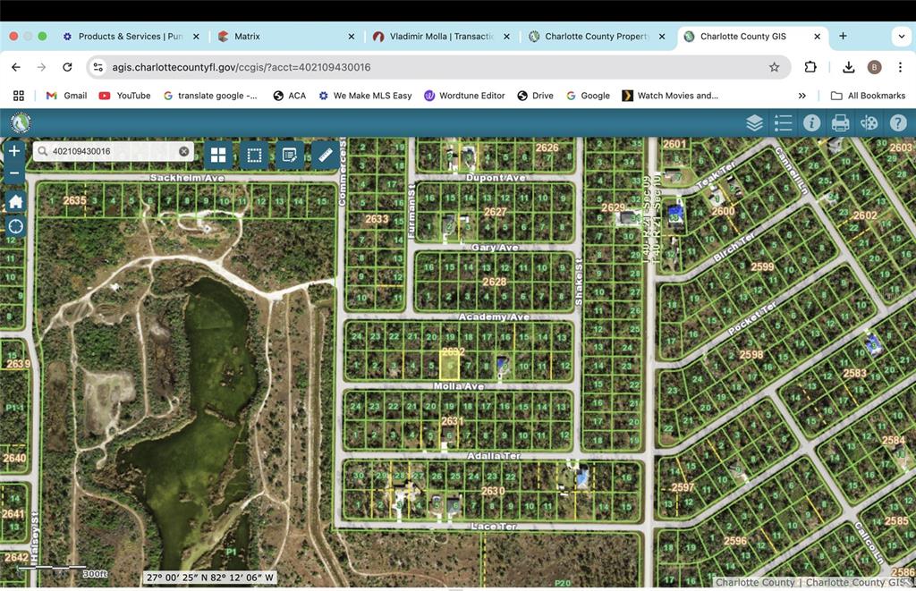 This is a digital map showing property parcel lines and street names in Charlotte County — 14452 MOLLA AVENUE, PORT CHARLOTTE, FL