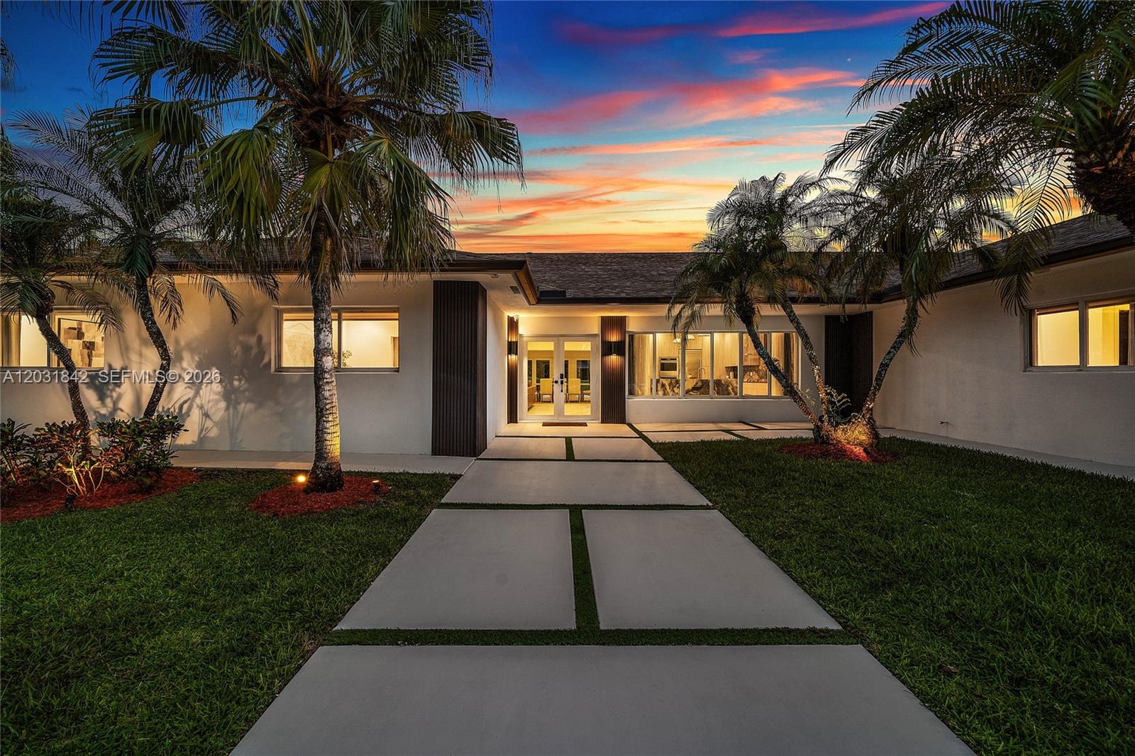 A single-story house with a white exterior, palm trees, and a modern concrete walkway — 13900 Mustang Trl, Southwest Ranches FL 33330, SOUTHWEST RANCHES, FL