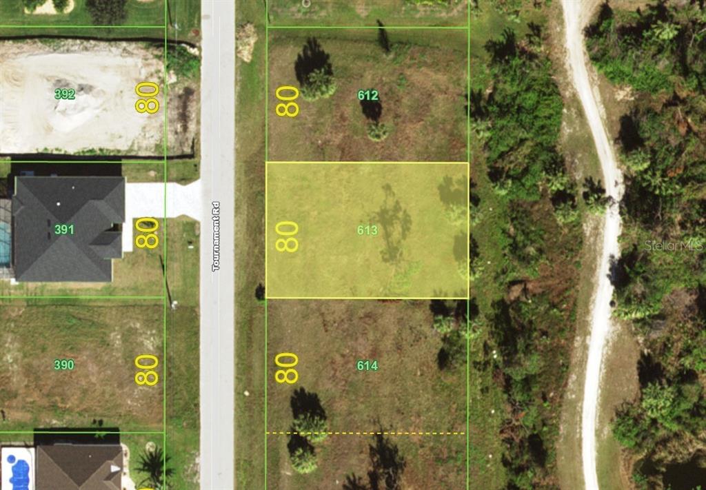 This is an aerial map showing a vacant rectangular lot highlighted in yellow — 212 TOURNAMENT ROAD, ROTONDA WEST, FL