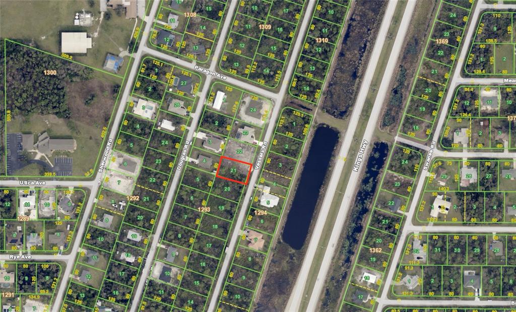 This is an aerial map showing residential lots and streets in a suburban neighborhood — 3419 VESSELS ROAD, PORT CHARLOTTE, FL