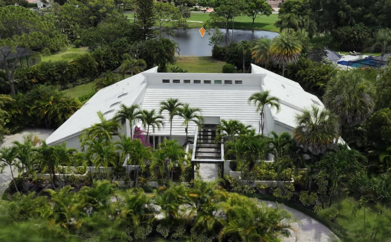 An aerial view of a white modern house with a flat roof and palm trees — 355 Oakview Drive, Delray Beach FL 33445, DELRAY BEACH, FL