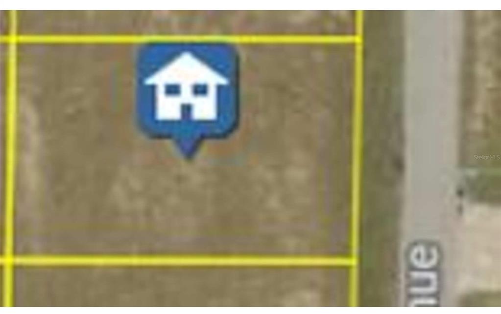 This is a map view showing a vacant rectangular lot outlined in yellow — 1154 NW 4TH AVENUE, CAPE CORAL, FL
