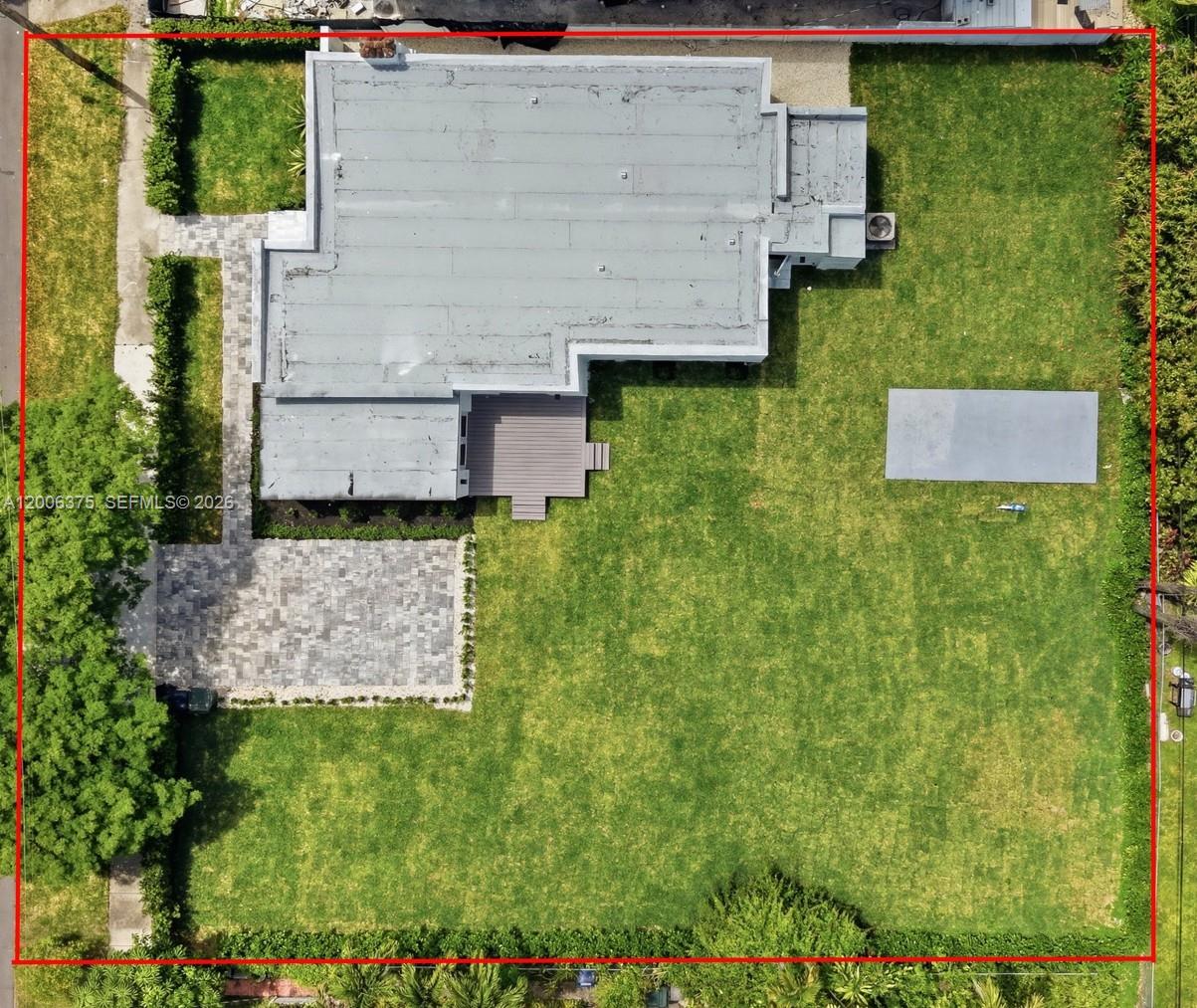 An aerial view shows a house with a flat roof, a deck, and a large yard — 5735 SW 12th St, West Miami FL 33144, WEST MIAMI, FL