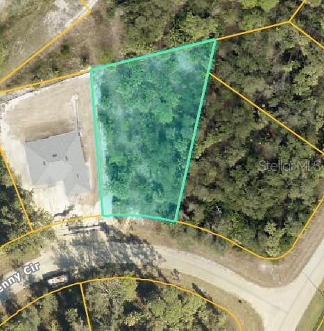 This is an aerial map showing a highlighted vacant lot next to a house — Lot 14 PENNY CIRCLE, NORTH PORT, FL