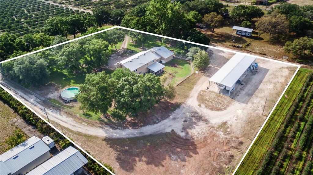 An aerial view shows a house with a pool, a large workshop, and surrounding land — 1646 TYNER ROAD, HAINES CITY, FL