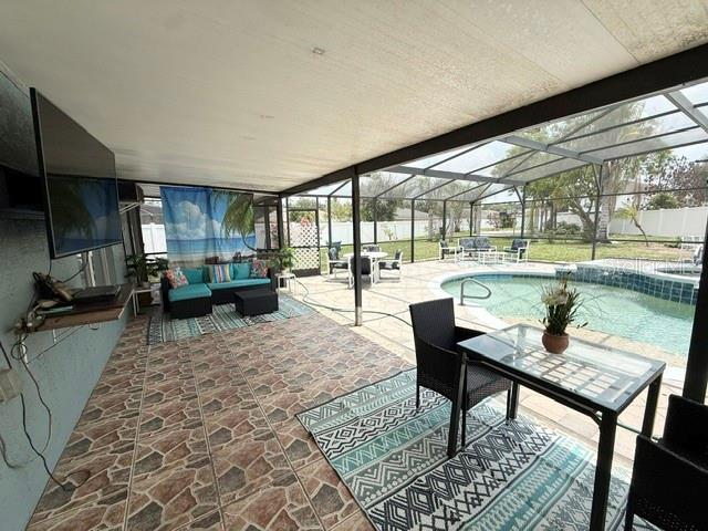 An aerial view shows a two-story gray house with white trim, a garage, and landscaping — 4914 NEWTON COURT, ST CLOUD, FL