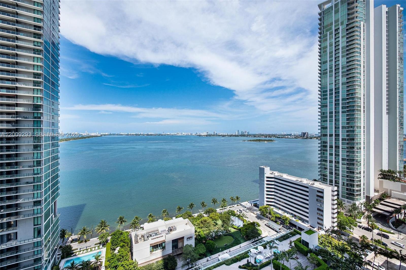 An elevated view of a bay between two tall residential towers and a park — 650 NE 32nd St # 2101, Miami FL 33137, MIAMI, FL