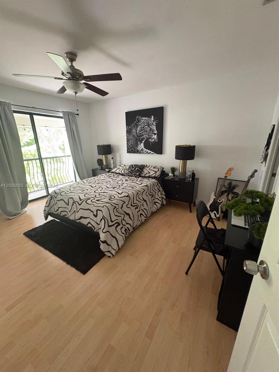 A bathroom features a corner glass shower, a white toilet, and patterned tile flooring — 7200 NW 2nd Ave # 1180, Boca Raton FL 33487, BOCA RATON, FL
