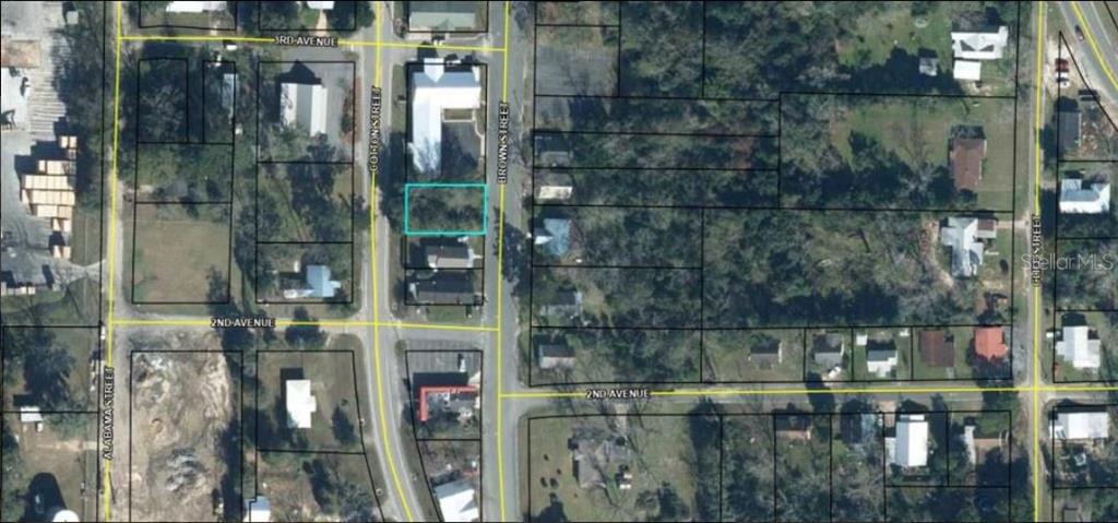 This is an aerial map showing a vacant rectangular lot outlined in blue between streets — 5279 BROWN STREET, GRACEVILLE, FL