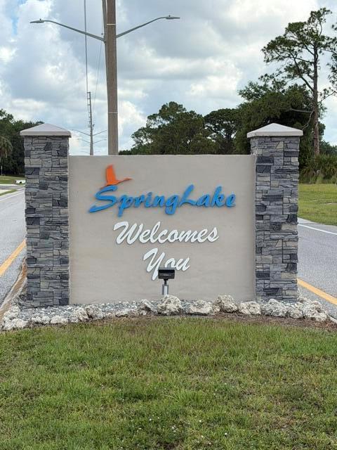 A stone-pillared monument sign welcomes visitors to the Springlake community — 816 Woodmont Street, Sebring FL 33876, SEBRING, FL