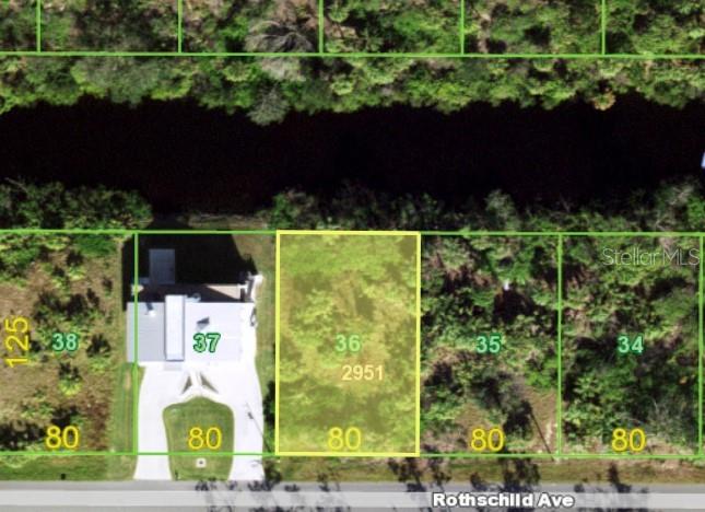 This is an aerial map showing a vacant residential lot highlighted in yellow on Rothschild Ave — 14232 ROTHSCHILD AVENUE, PORT CHARLOTTE, FL
