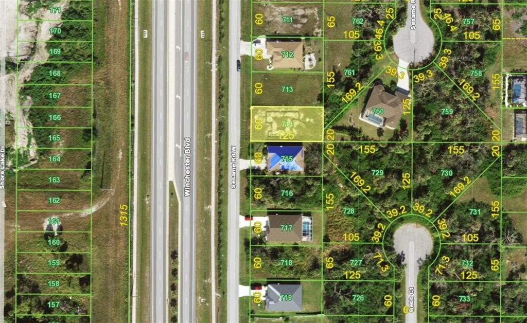 This is an aerial map showing residential lots and street layouts — 127 SESAME ROAD W, ROTONDA WEST, FL