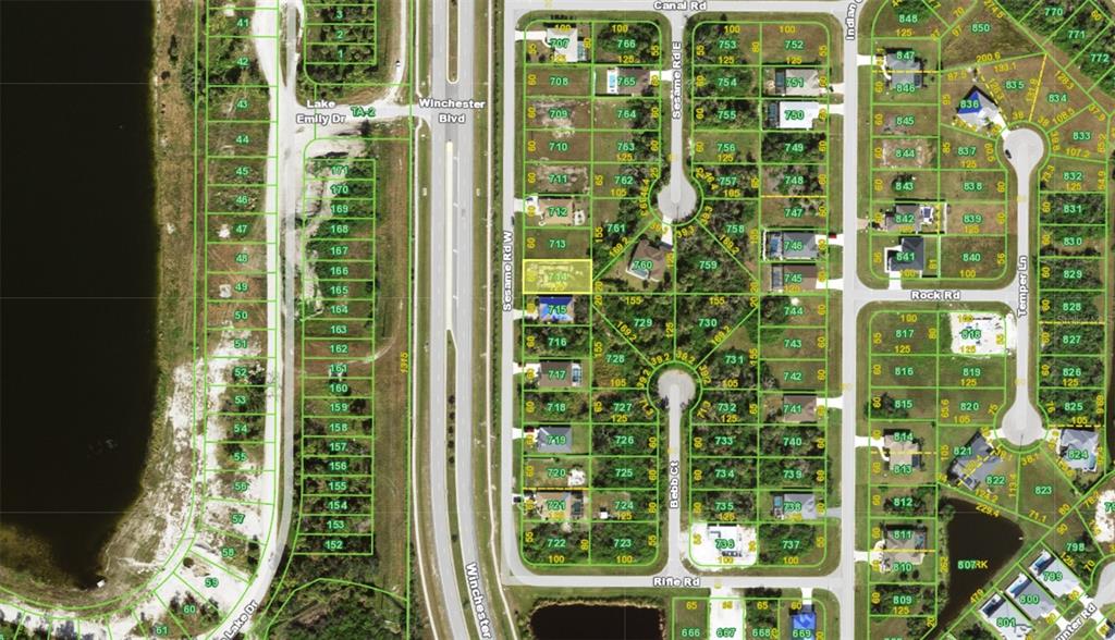 This is a satellite map view of a residential neighborhood with highlighted property boundaries — 127 SESAME ROAD W, ROTONDA WEST, FL