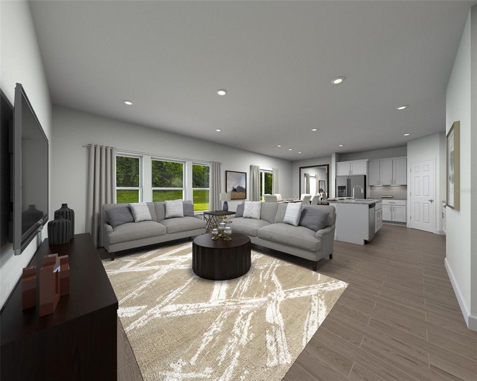 This rendering shows an open-concept living room and kitchen with gray sofas and tile flooring — 5318 WILLOW CREEK, HAINES CITY, FL