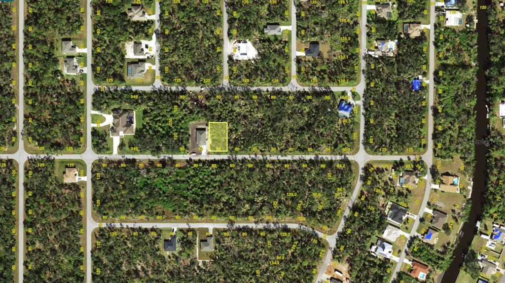 This is an aerial map showing a highlighted vacant lot in a residential neighborhood — 14316 STANFIELD AVENUE, PORT CHARLOTTE, FL