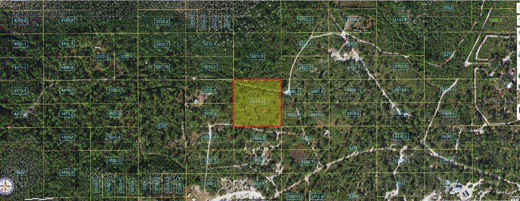 An aerial map view shows a highlighted rectangular plot of land surrounded by wooded lots — HOLOPAW GROVES ROAD, ST CLOUD, FL