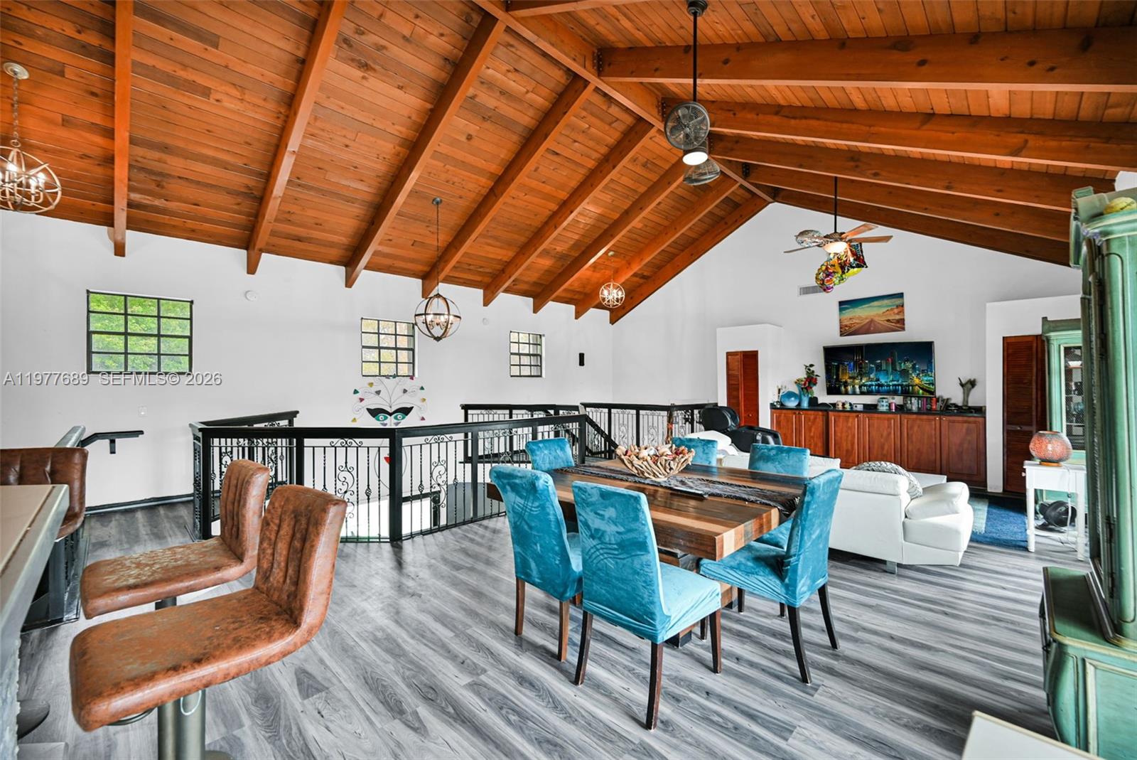 A two-story white house with a large oak tree and two cars in the driveway — 18950 SW 50th St, Southwest Ranches FL 33332, SOUTHWEST RANCHES, FL