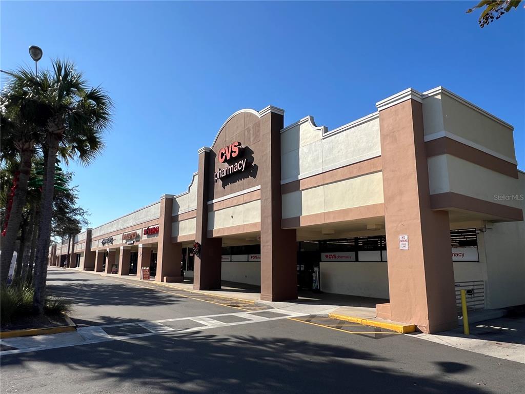 A CVS Pharmacy storefront is located in a strip mall with a covered walkway — 1074 MONTGOMERY ROAD UNIT 1042-1046, ALTAMONTE SPRINGS, FL