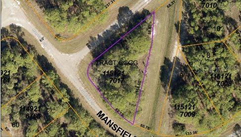 This is an aerial map view of a triangular-shaped vacant land parcel labeled Tract GGGG — MANSFIELD CIRCLE, NORTH PORT, FL