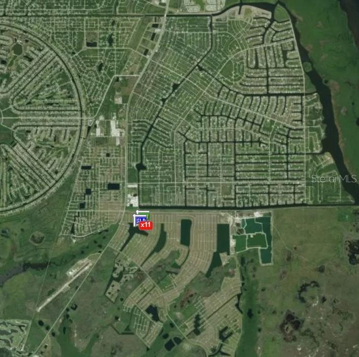 This is an aerial map view showing residential neighborhoods and surrounding land — 6 ELM DRIVE, PLACIDA, FL