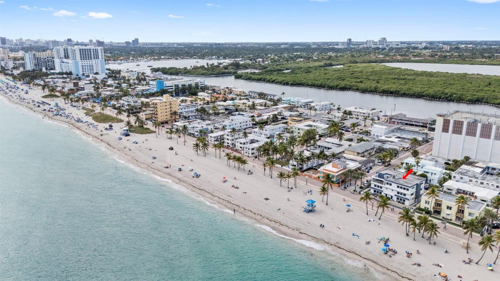 An aerial view of a beach town with a red arrow pointing to a building — 2203 N Surf Road, Hollywood FL 33019, HOLLYWOOD, FL