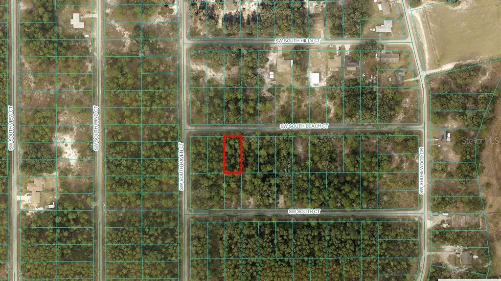 This is an aerial map showing a vacant, wooded residential lot highlighted in red — Lot#11 SW SOUTH BEACH COURT, DUNNELLON, FL